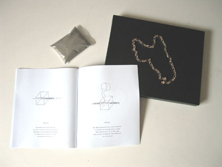 Money Makes Taste. Piero Golia. Instructions, cement and gold chain.